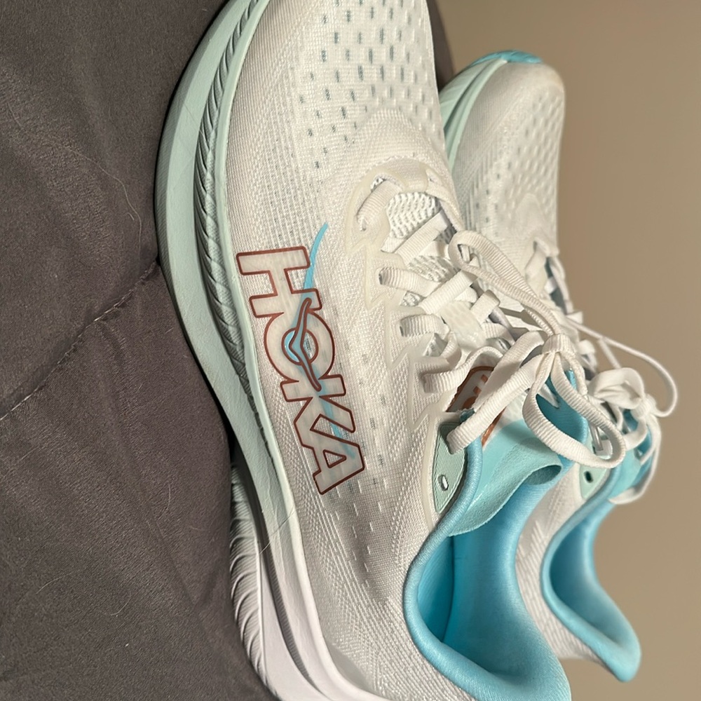 Hoka ladies size 10 running shoes, worn only a few times.